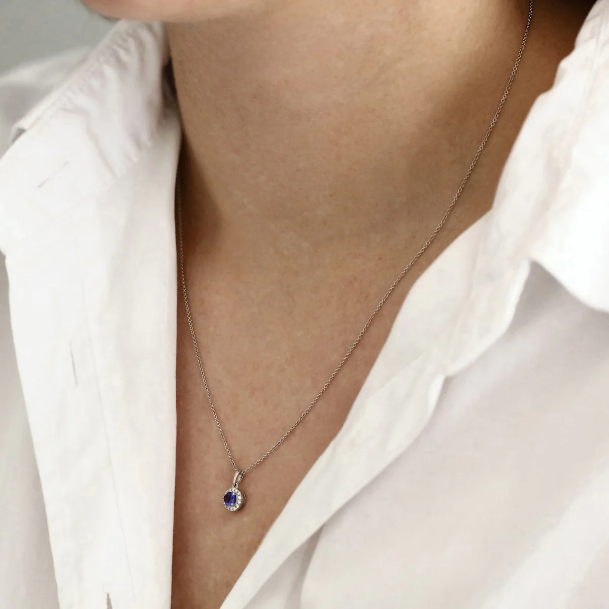 Bijou Collection 0.26ct Tanzanite and 0.06ct Diamond Halo Pendant | 9K White Gold - Image 5