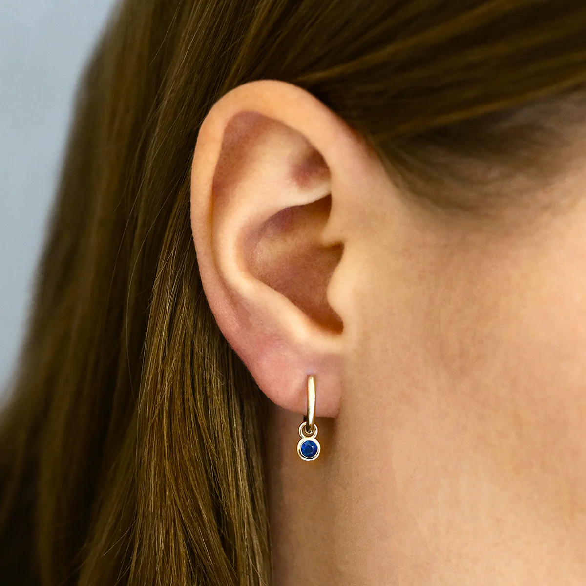 Birthstone Collection 0.33ct Sapphire Drop Hoop Earrings | 9K Yellow Gold - Image 5