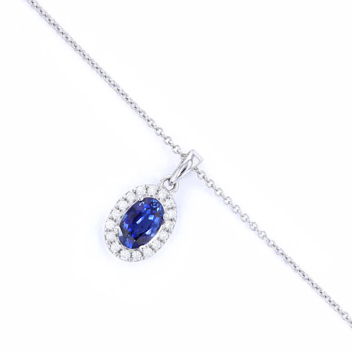 Bijou Collection 0.52ct Oval Cut Sapphire & Diamond Halo Necklace | 9K White Gold - Image 2