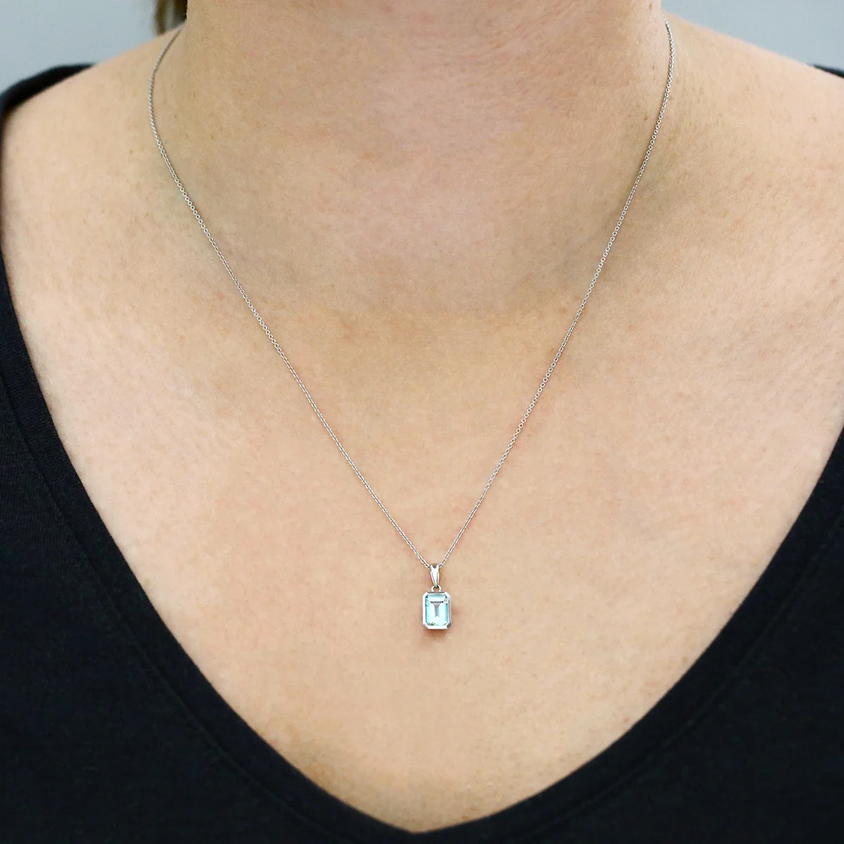 Birthstone Collection 0.76ct Emerald Cut Aquamarine Bezel Set Pendant | 9K White Gold - Image 4