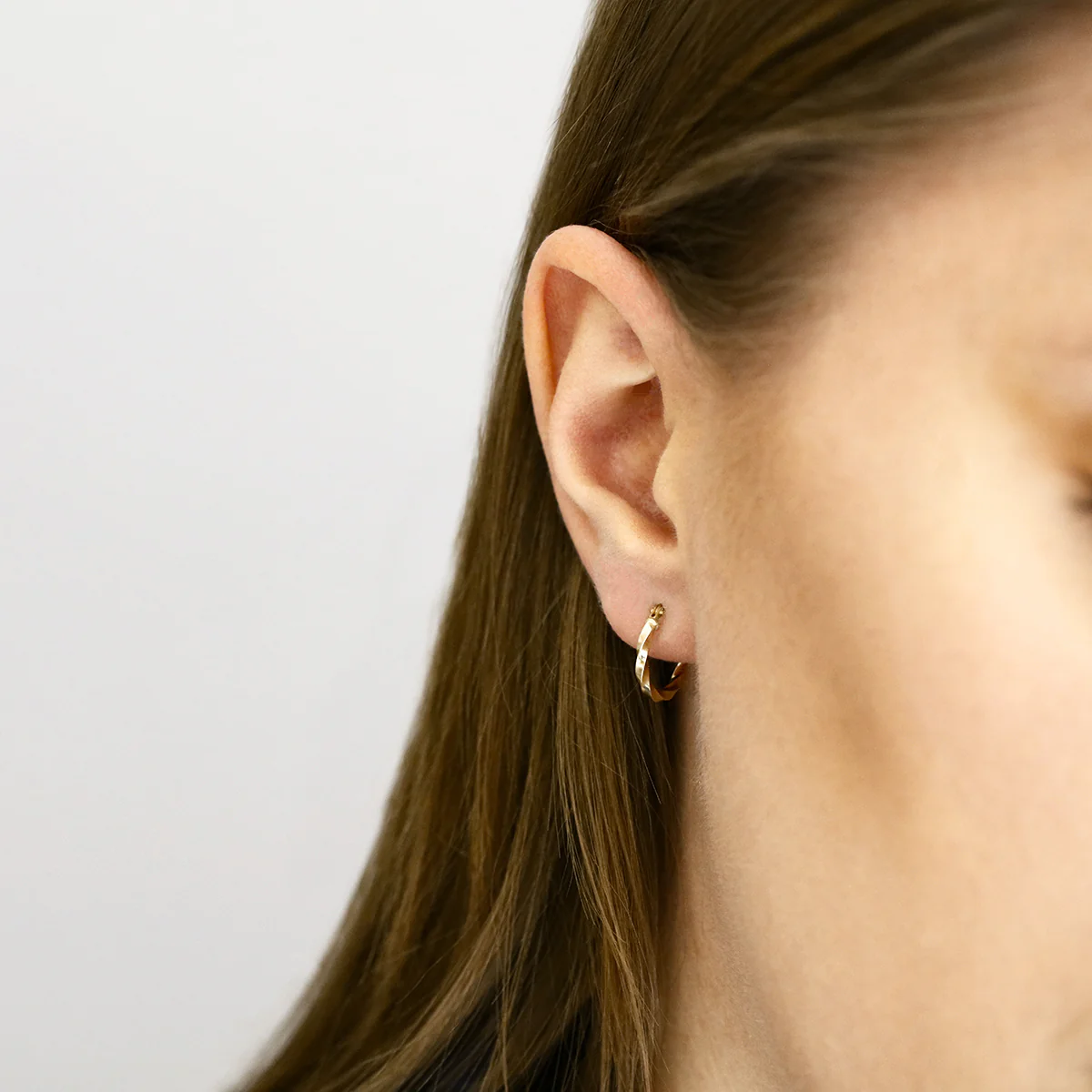 Soleil Collection 10mm Twist Hoop Earrings | 9K Yellow Gold - Image 5
