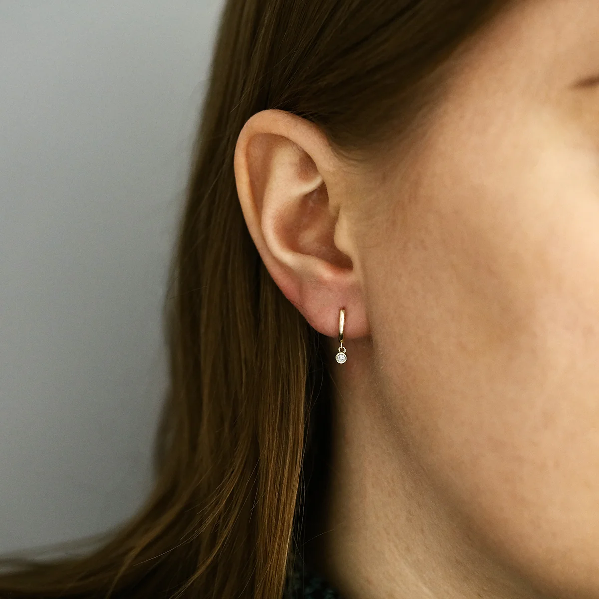 Soleil Collection Diamond Drop Bezel Set Huggie Earrings | 9K Solid Yellow Gold - Image 6