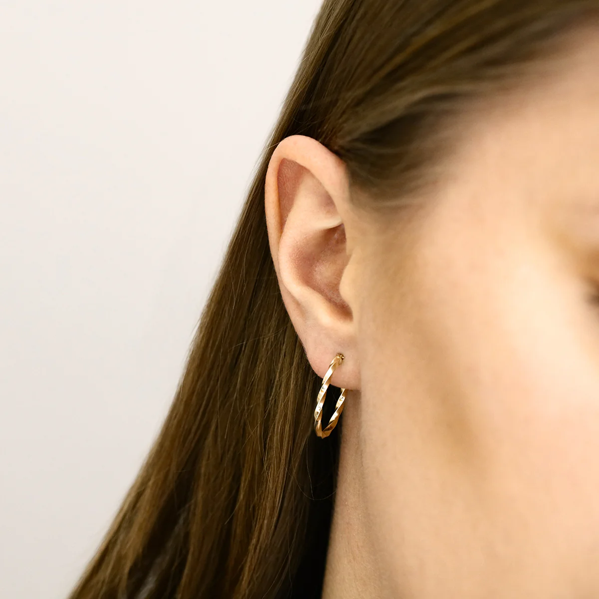 Soleil Collection Oval Twist Hoop Earrings | 9K Yellow Gold - Image 5