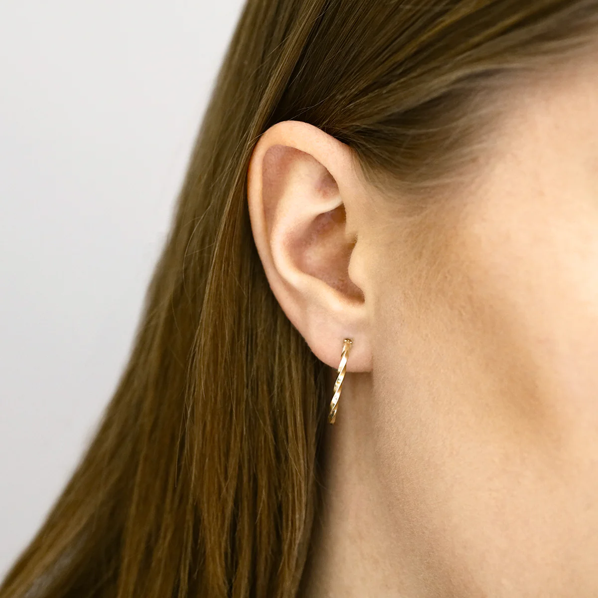 Soleil Collection Oval Twist Hoop Earrings | 9K Yellow Gold - Image 6